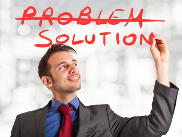 Businessman writing a positive concept