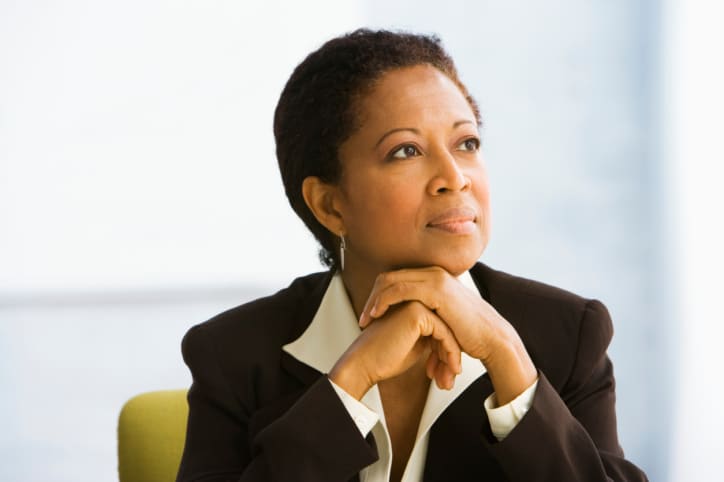 sales woman contemplating management position