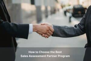 two business professionals shaking hands forming a sales assessment partnership